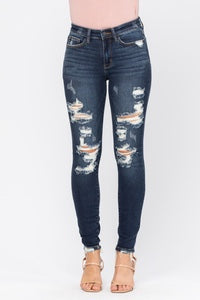 MID-RISE DESTROYED SKINNY JEANS