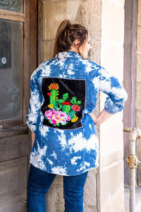 DENIM BLEACHED WASH LONG SLEEVE TOP WITH EMBROIDERED PATCH ON BACK