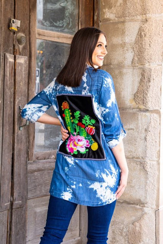 DENIM BLEACHED WASH LONG SLEEVE TOP WITH EMBROIDERED PATCH ON BACK