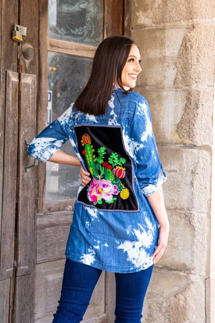 DENIM BLEACHED WASH LONG SLEEVE TOP WITH EMBROIDERED PATCH ON BACK